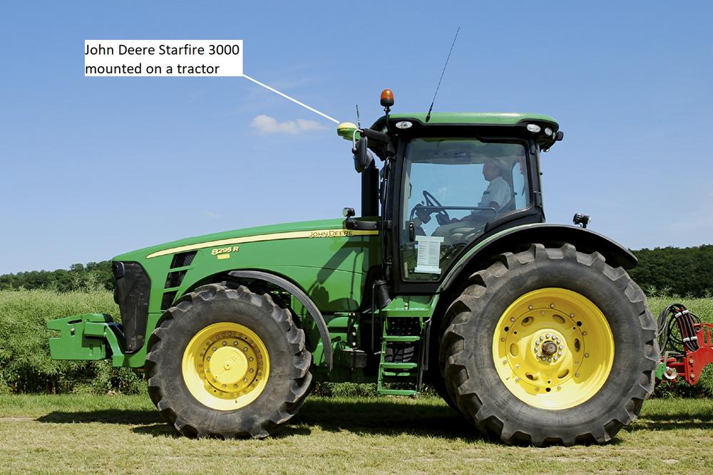 John Deere Starfire 3000 mounted on a tractor